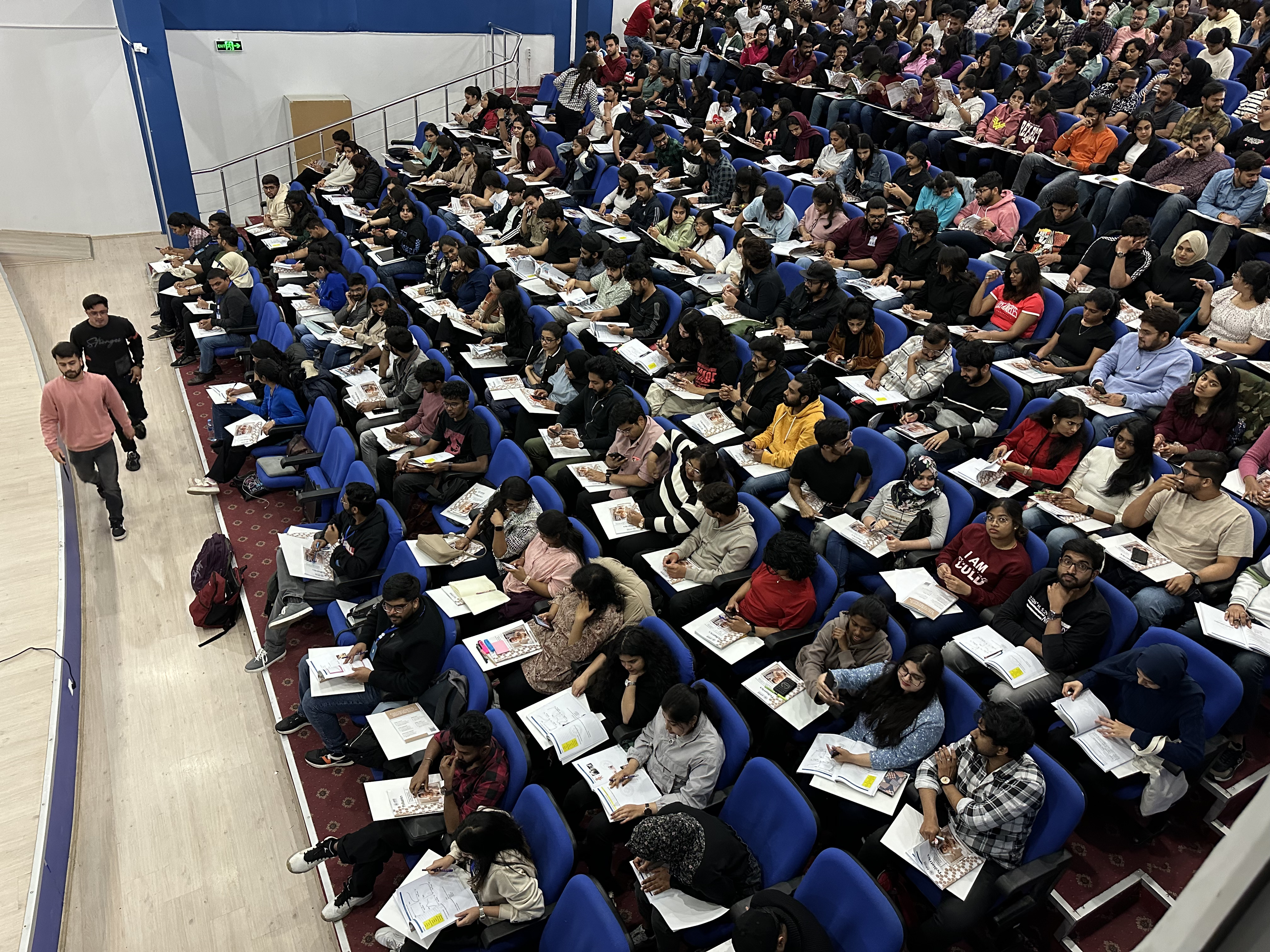 Hundreds of students in focused study — exclusive FMGE prep session