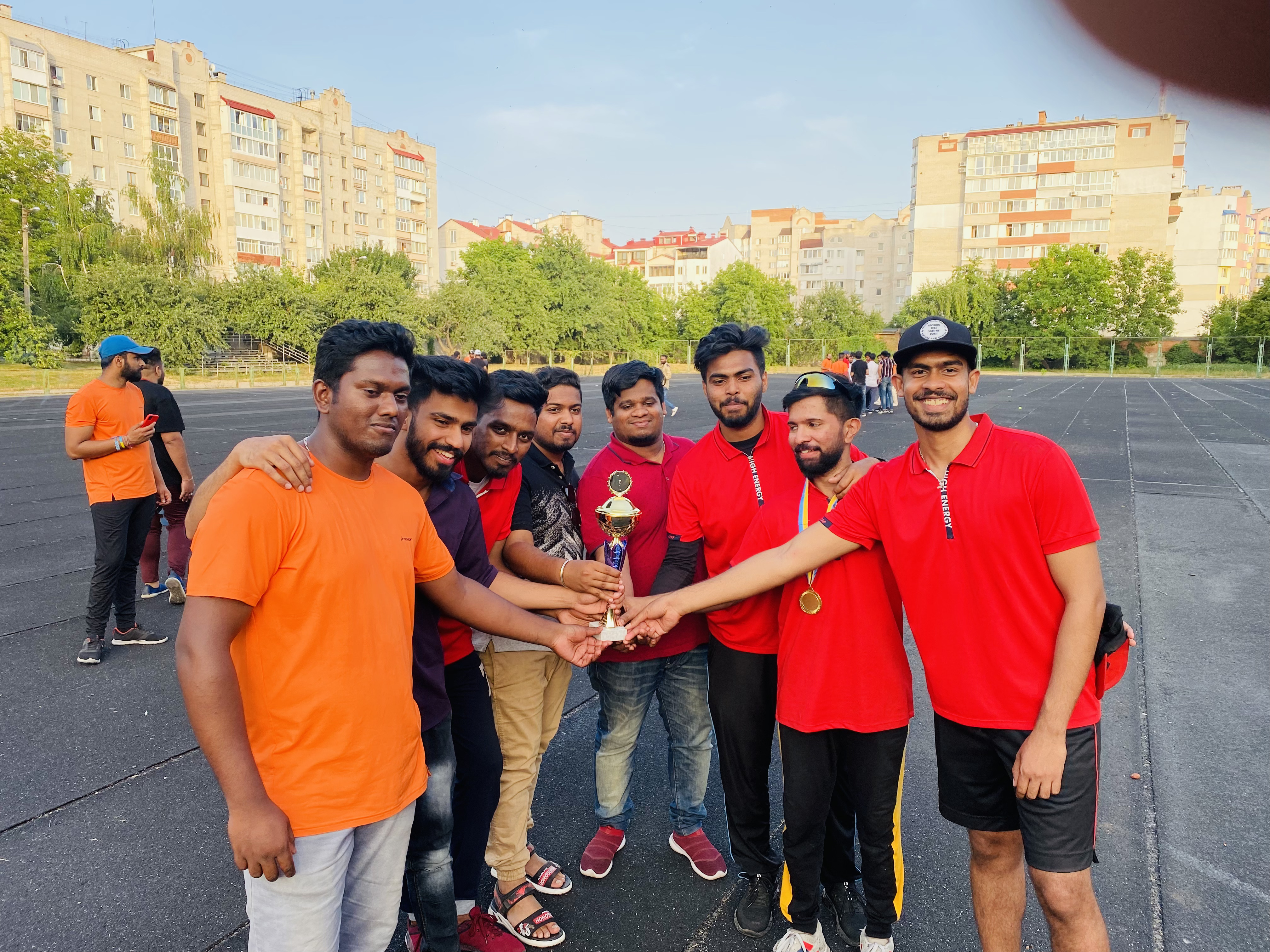 Trophy lift — students celebrate their tournament win