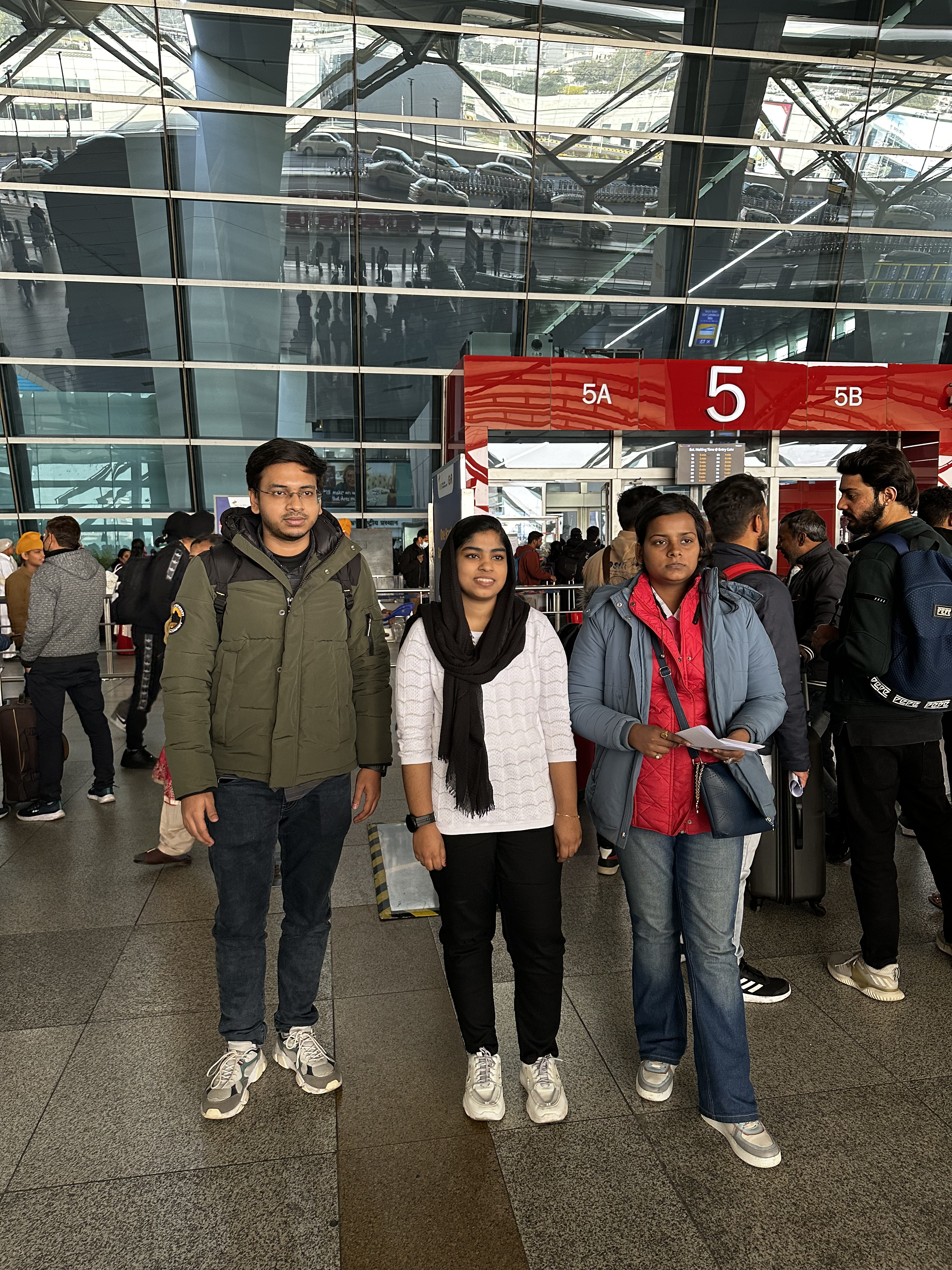 Patrick's students at Delhi Airport — gateway to their dream